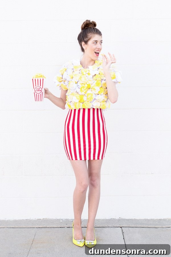 A woman wearing a popcorn costume