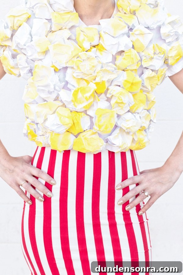 A woman wearing a popcorn costume