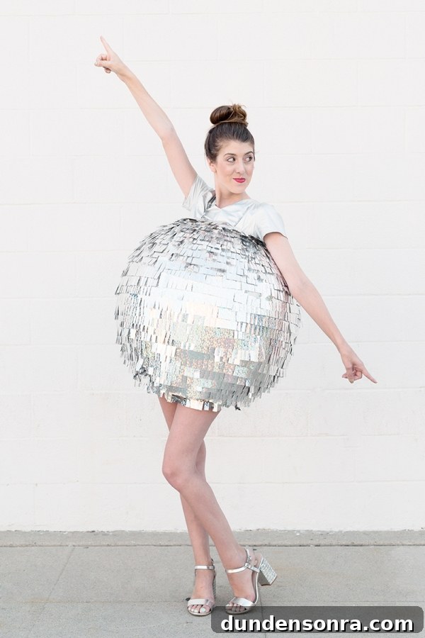 DIY Mirrored Disco Ball Costume Ideas for Halloween and Parties 2 A woman dressed as a disco ball