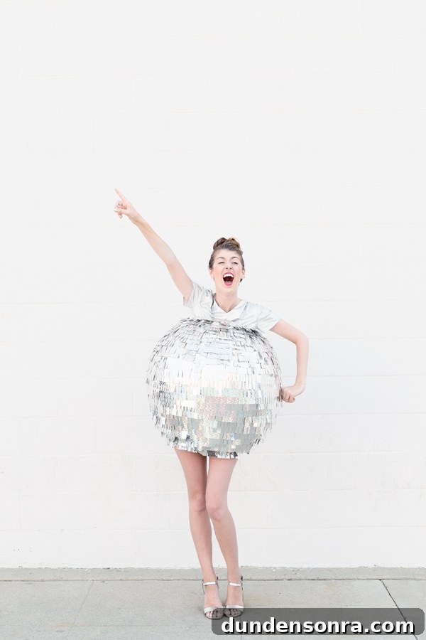 DIY Mirrored Disco Ball Costume Ideas for Halloween and Parties 11 A woman dressed as a disco ball