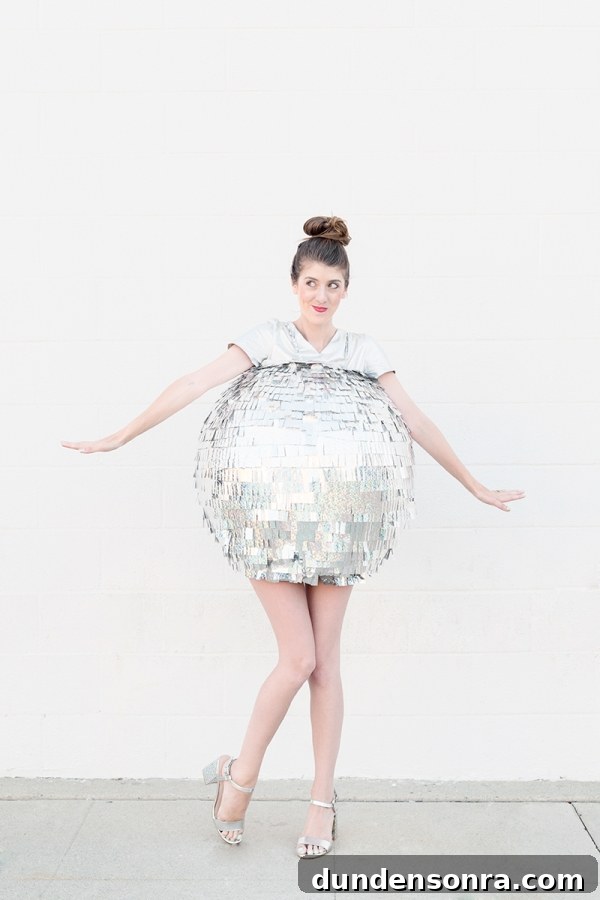 DIY Mirrored Disco Ball Costume Ideas for Halloween and Parties 9 A woman dressed as a disco ball