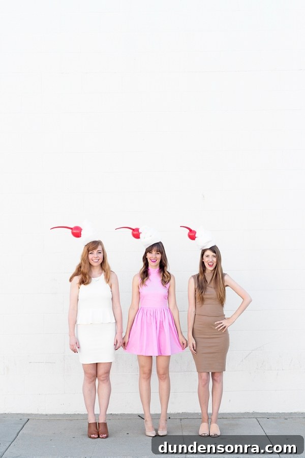 Three girls dressed in milkshake costumes