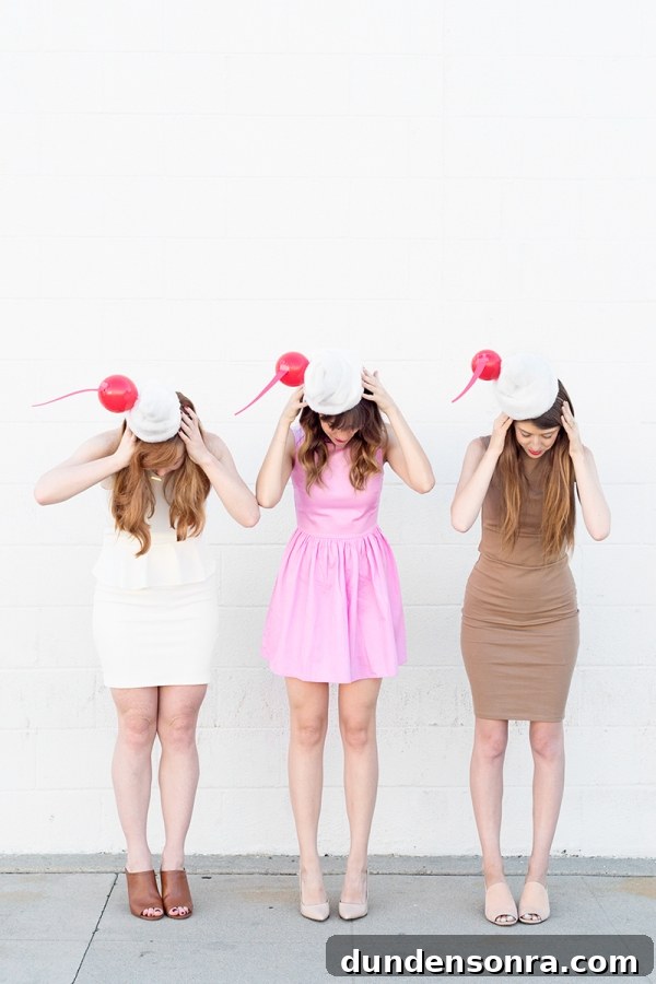 Three girls dressed in milkshake costumes