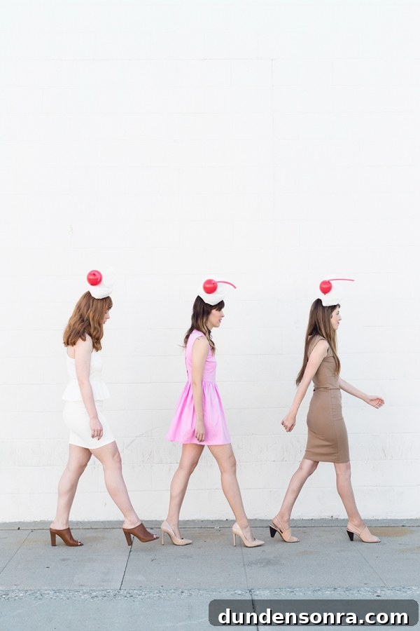Three girls dressed in milkshake costumes