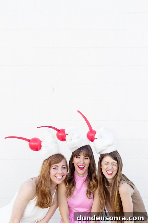 Three girls dressed in milkshake costumes