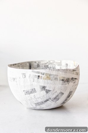 DIY Cereal Bowl Costume Ideas for Halloween and Cosplay 6 A ball with newspaper on it