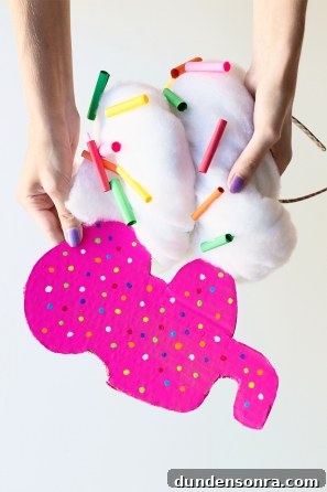 Cotton with colorful paper and a pink paper cut out