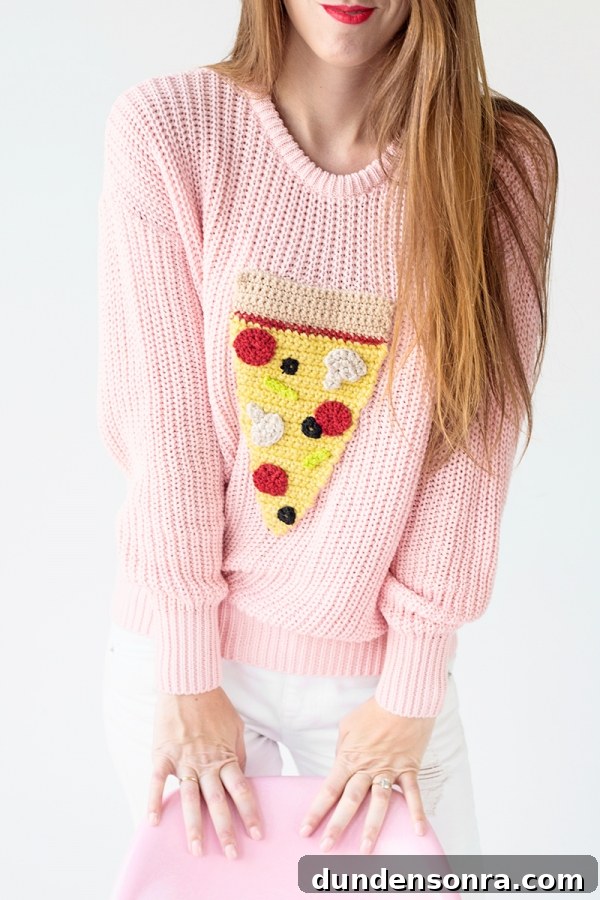 Someone wearing a pizza sweater