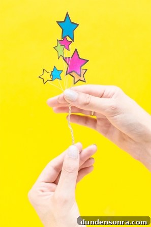 Someone holding paper stars 