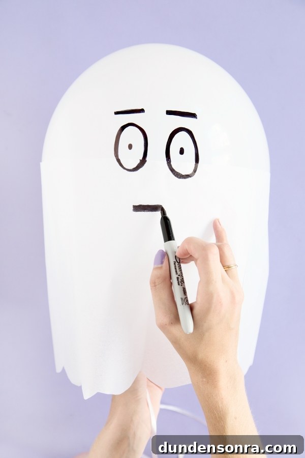 DIY Silly Ghost Balloons | studiodiy.com