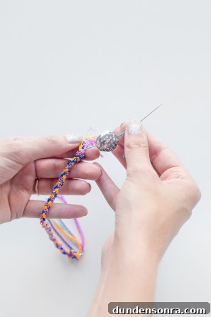 Handmade Friendship Bracelets: Patterns, Tips & Tutorials 12 Someone making a friendship bracelet