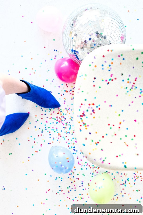Studio DIY and Modernica Confetti Chair Reveal + Giveaway 14 A chair with colorful dots and balloons