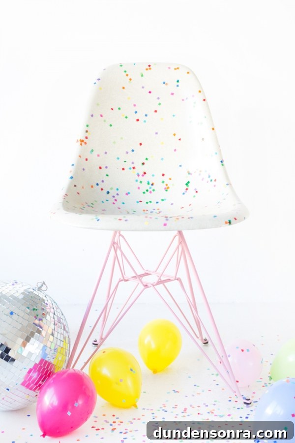 Studio DIY and Modernica Confetti Chair Reveal + Giveaway 4 A chair with colorful dots and balloons