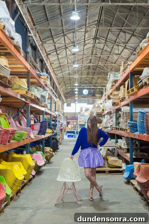 Studio DIY and Modernica Confetti Chair Reveal + Giveaway 5 A woman standing in the middle of an aisle