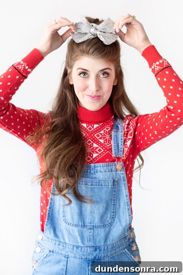 Sparkling Holiday Outfit Ideas: Head-to-Toe Party Looks 12 A woman wearing overalls and a red sweater