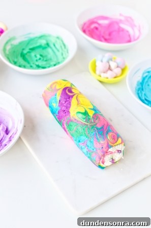 Rainbow yule log dessert and frosting