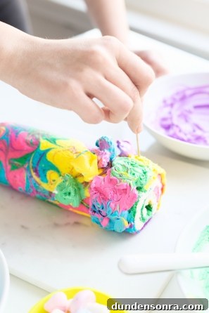 Rainbow yule log dessert