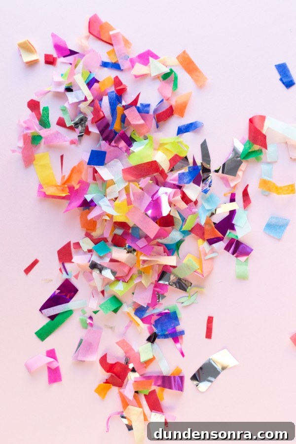 Complete Guide to Using Confetti for Parties and Events 11 Confetti on a pink table