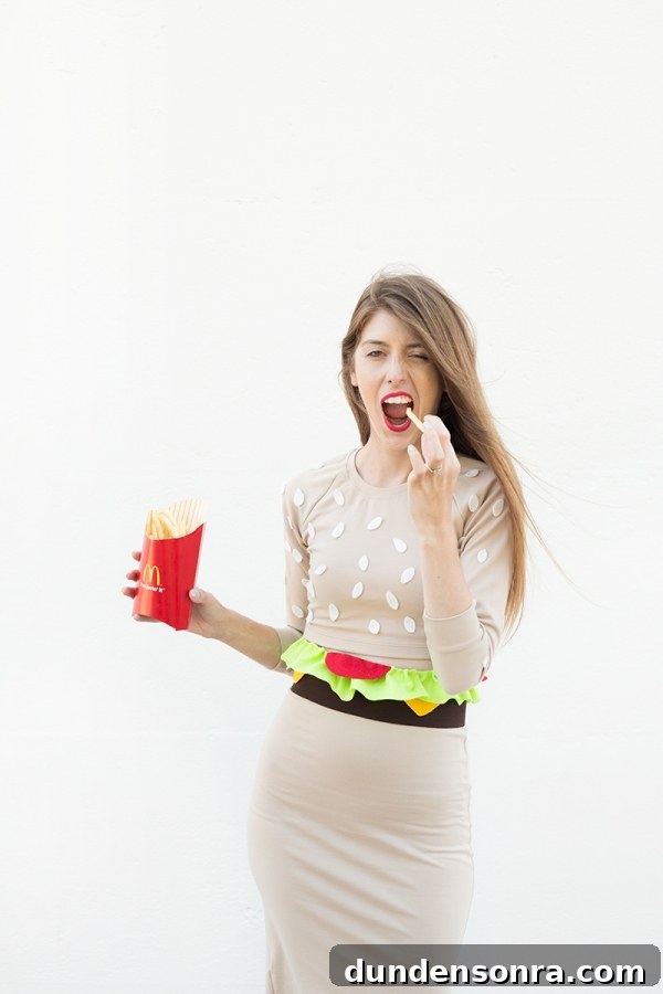 A woman wearing a hamburger costume
