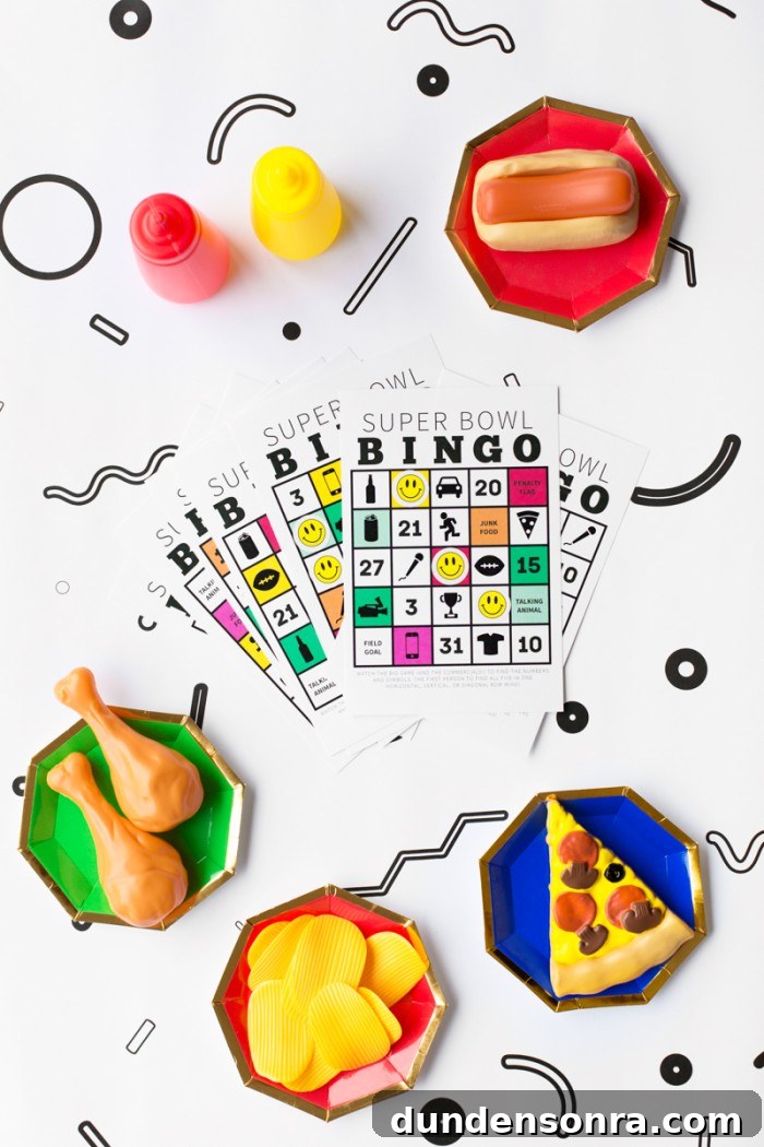 super bowl bingo cards surrounded by play food on plates
