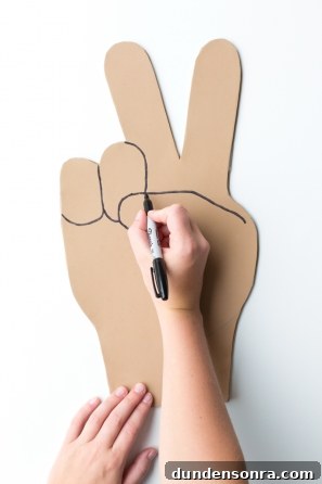 Someone drawing on cardboard 