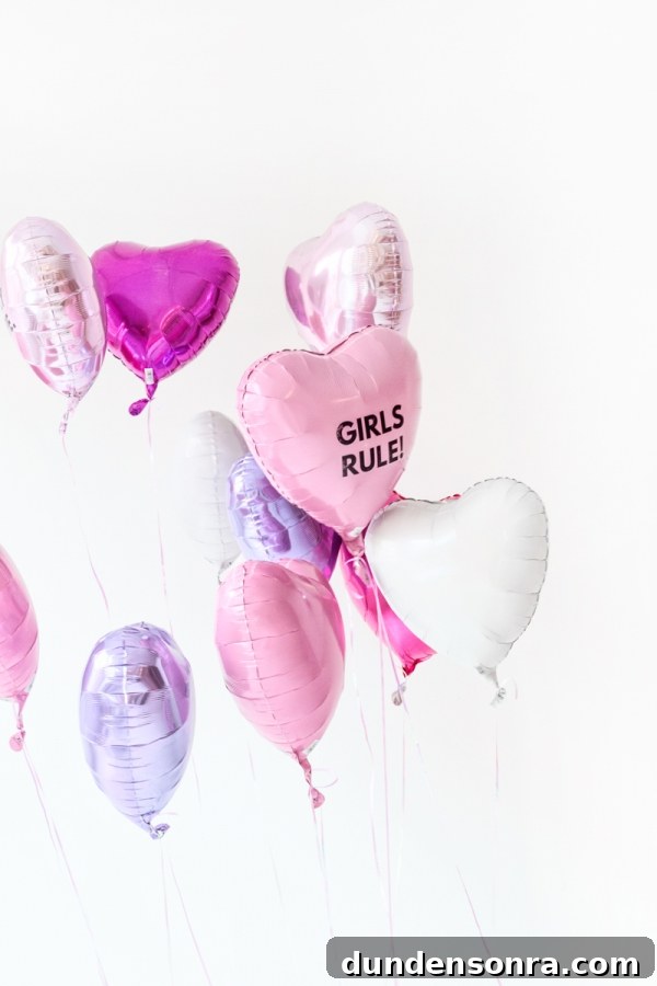 Pink, purple, and white heart shaped balloons