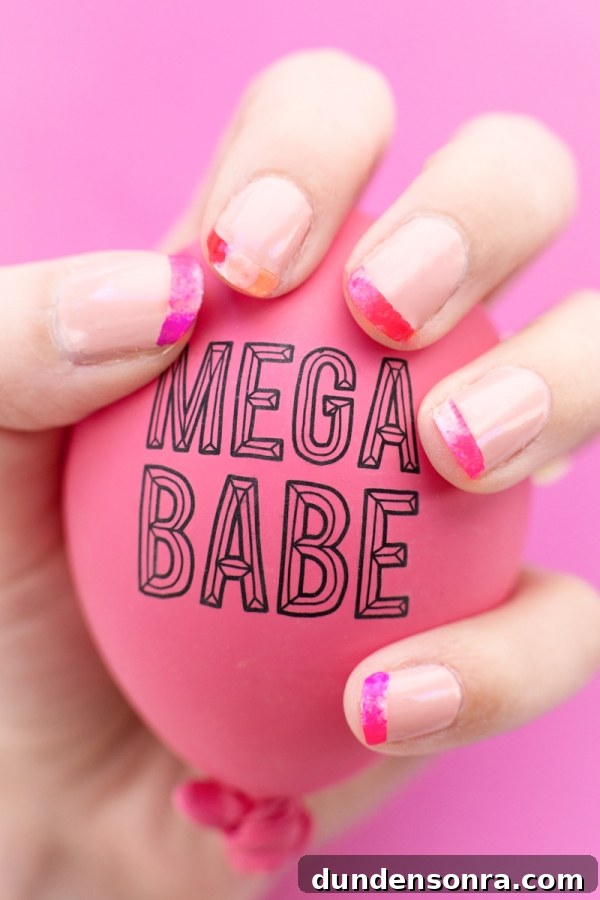 Someone holding ball that says 'mega babe'