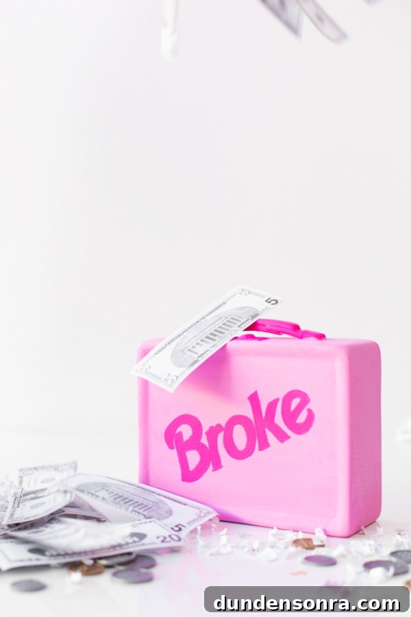 Make a Lunchbox Piggy Bank: DIY Step-by-Step Guide 8 A pink box and fake money