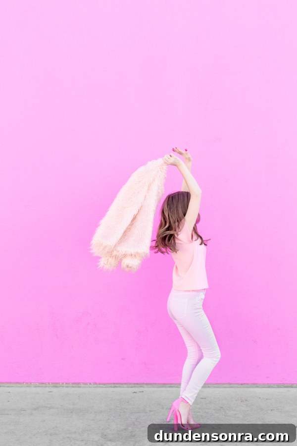 3 Stylish Ways to Wear Light and Monochrome Outfits 8 A woman wearing an all pink outfit
