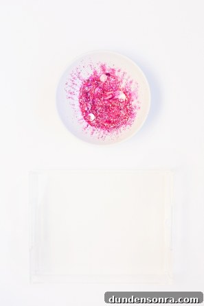 Make Your Own Sparkling Resin Glitter Tray: Simple DIY Guide 5 A plate with pink glitter