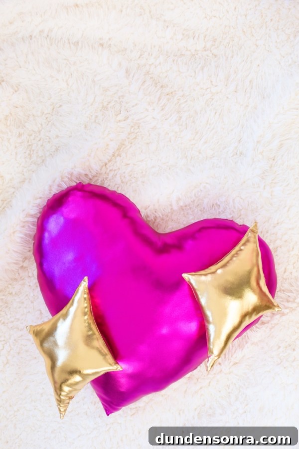 A gold and pink pillow