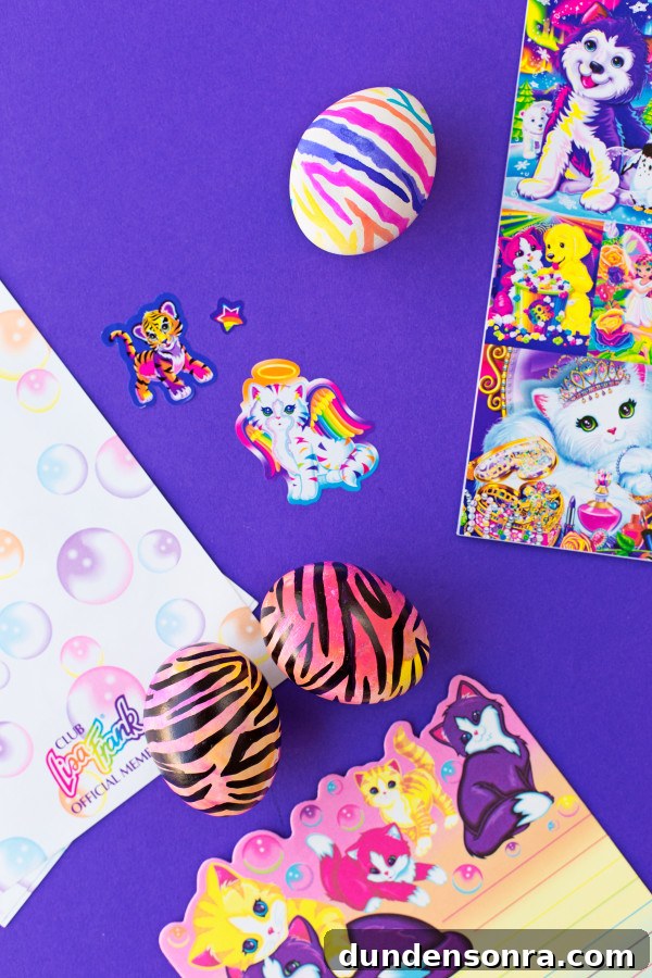 DIY Lisa Frank Easter Eggs: Vintage-Inspired Colorful Egg Ideas 12 Colorful eggs with animal prints on them and stickers