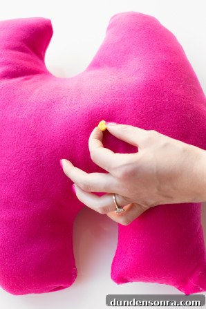 Pink fabric and cotton balls