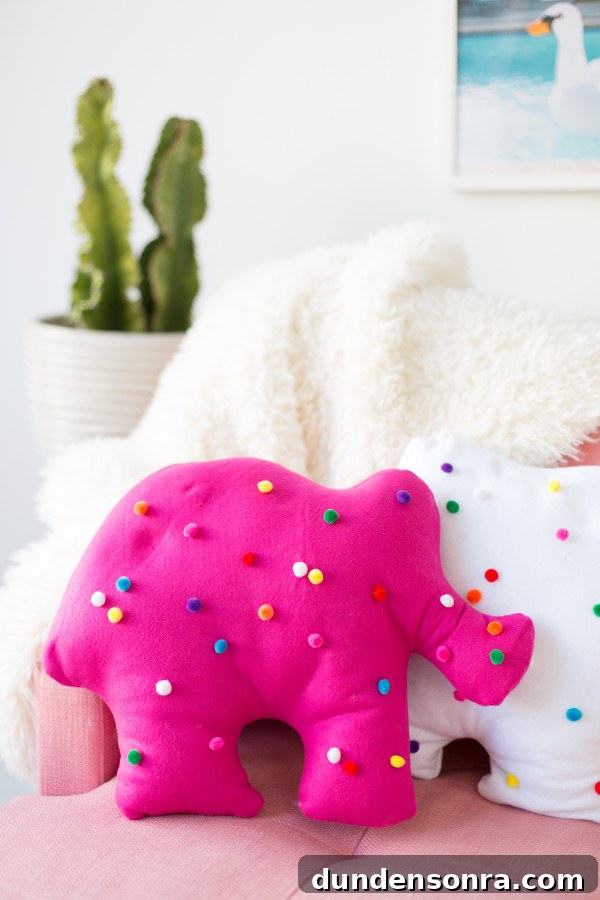 Pink circus animal cookie pillow