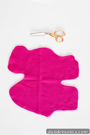 Pink fabric and scissors