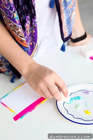 Create Rainbow-Edged Stationery: DIY Guide and Tips 4 Someone painting a card