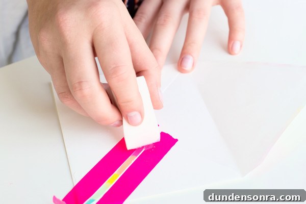 Create Rainbow-Edged Stationery: DIY Guide and Tips 5 Someone painting a card