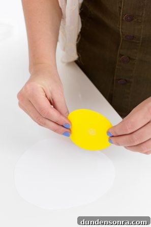Someone holding a yellow paper