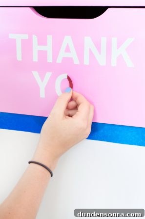 Pink surface with white lettering