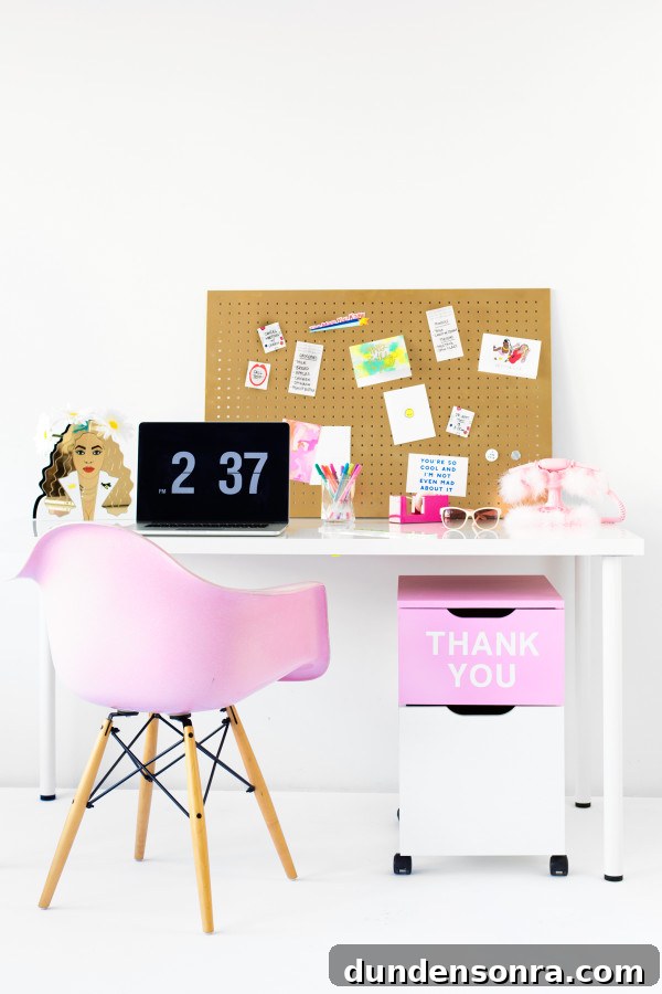 A desk with a pink chair and drawers 