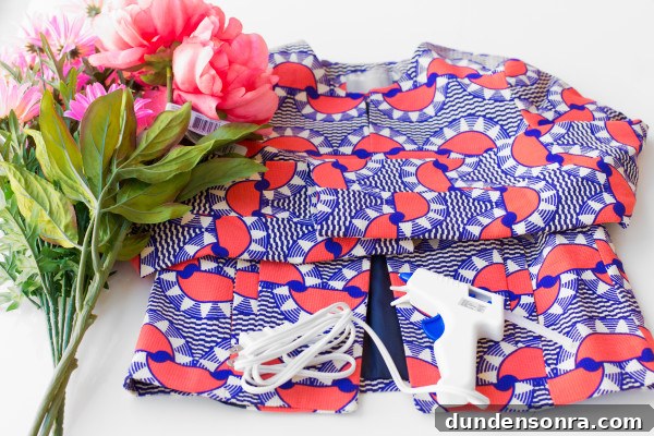 How to Make a Faux Flower Coat: Step-by-Step DIY Guide 2 A jacket and hot glue gun