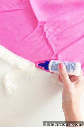 Pink fabric and white tassels