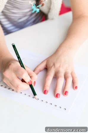 Someone drawing on a notebook