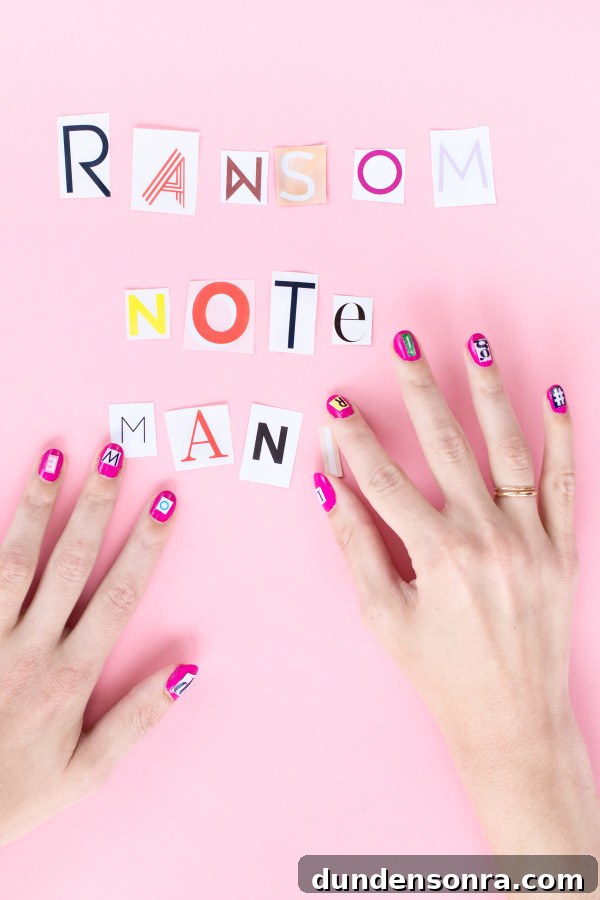 Someone with pink nails and lettering