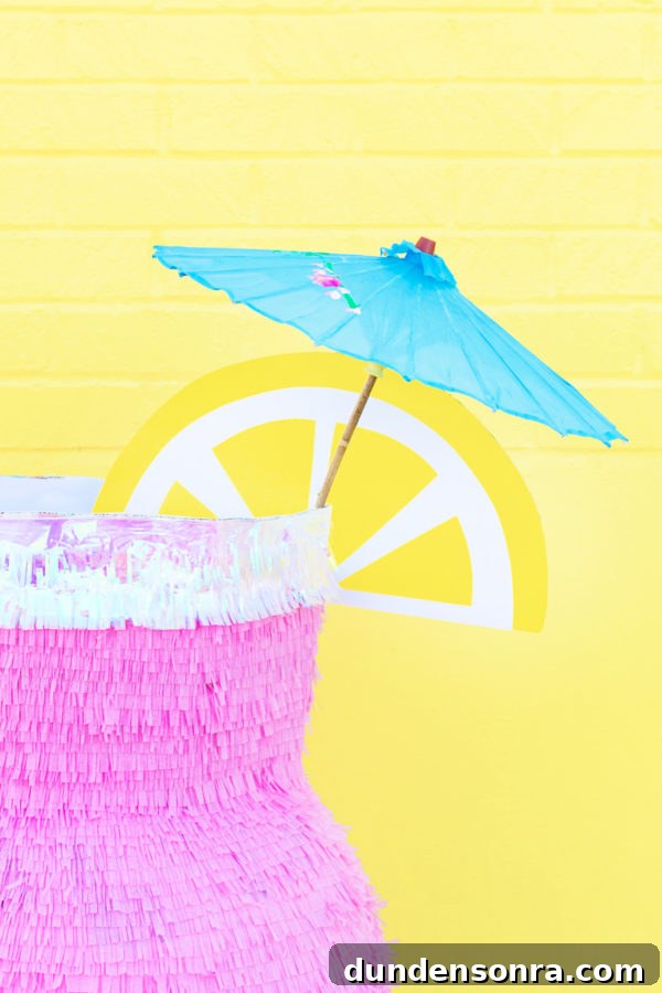 DIY Tropical Drink Piñata Tutorial: How to Make a Pineapple Party Piñata 4 A pinata