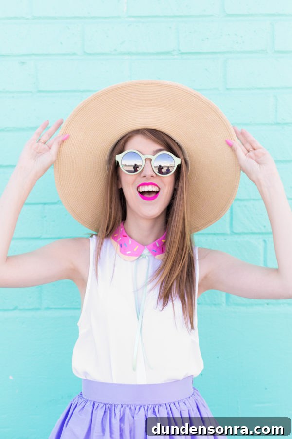 A woman wearing sunglasses and a hat