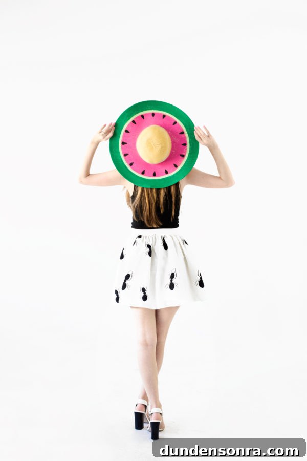 DIY Watermelon Hat: Cute Summer Floppy Sun Hat Tutorial 9 Someone holding a watermelon hat