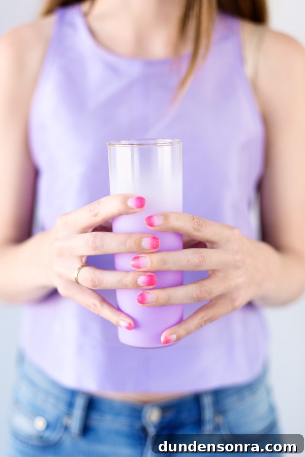 Someone holding a glass