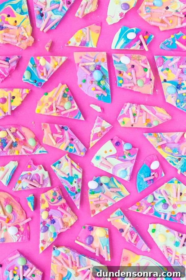 Colorful candy on a pink table