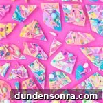 Colorful candy on a pink table